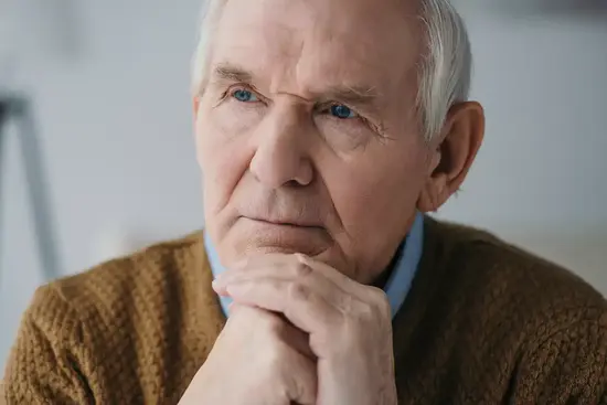 senior-thoughtful-man-leaning