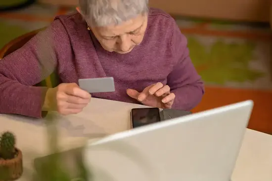 senior-woman-with-credit-card